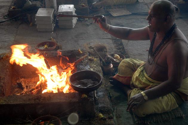 A priest performs a yagna (Photo: PTI/File) A priest performs a yagna (Photo: PTI/File)